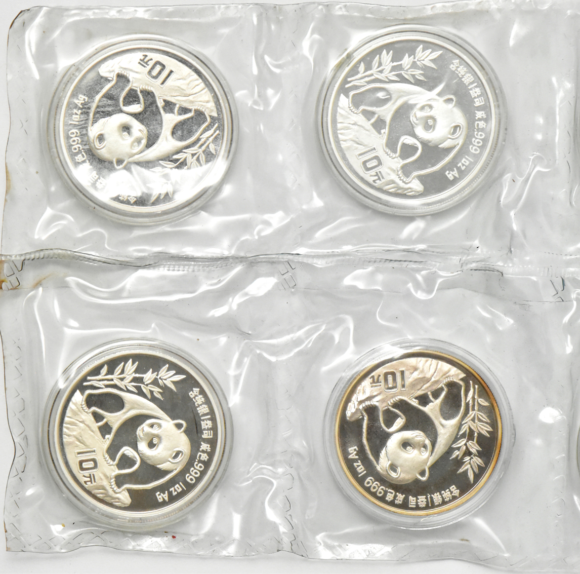 China - Ten 1990 lg. date, plain 1 1oz silver Panda 10 yuan - double sealed