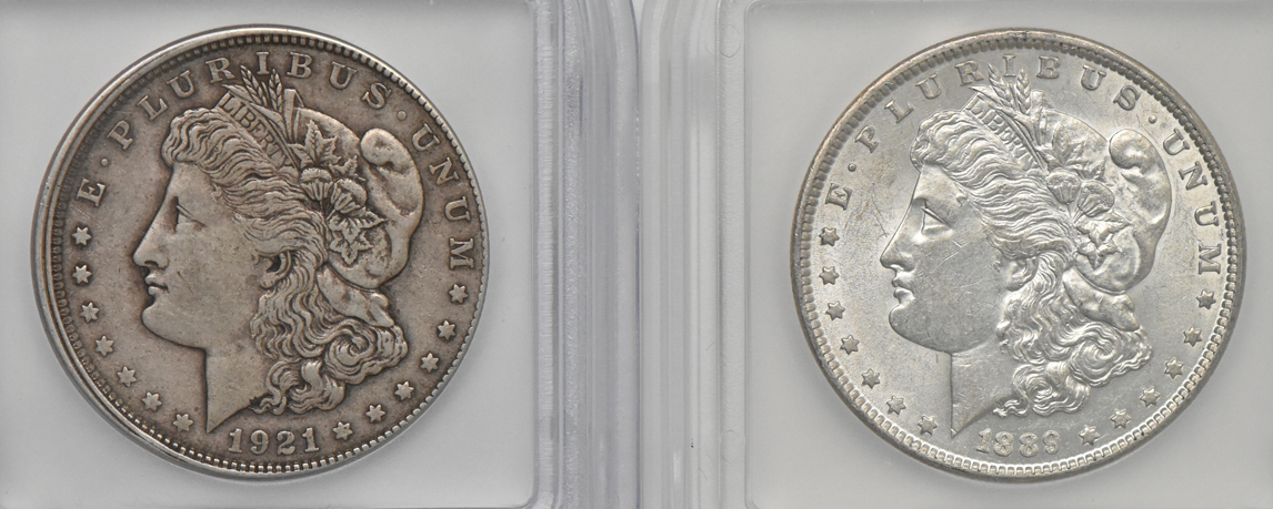 Five Morgan dollars with a rotated reverse