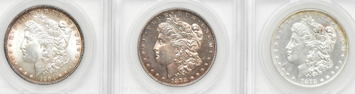 Six SEGS certified Morgan silver dollars with peculiarities