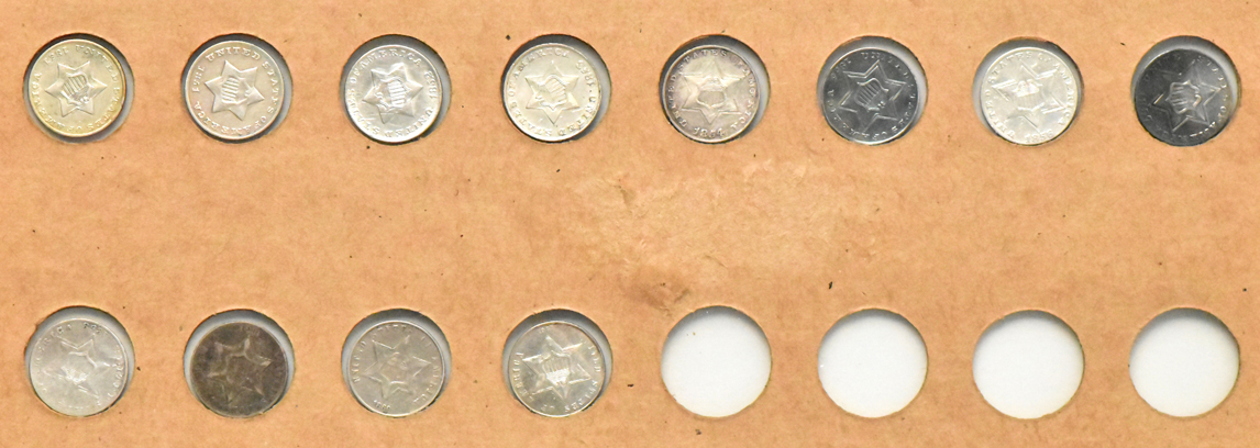 Twelve silver three-cent pieces in a Wayte Raymond page