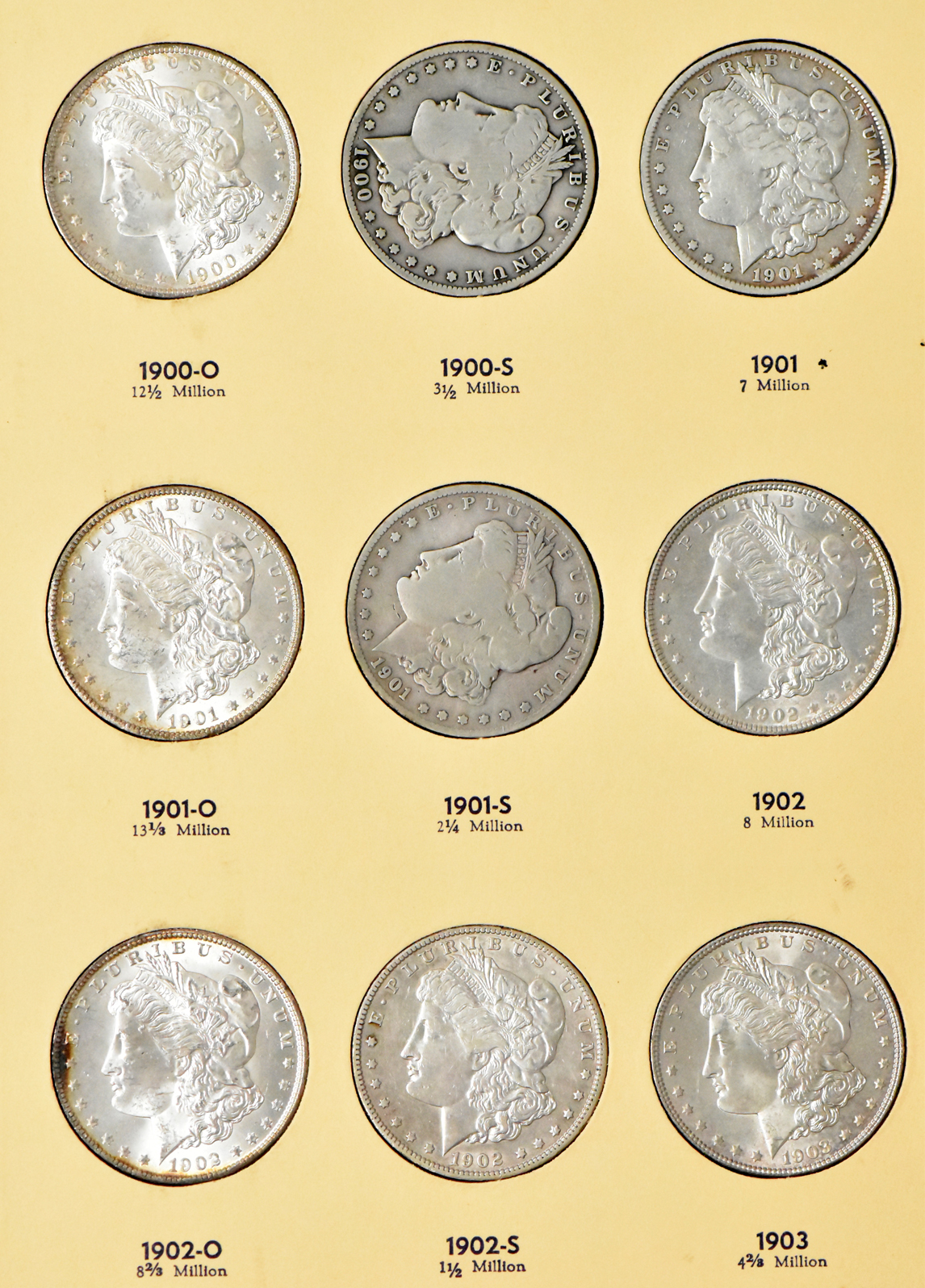 Collection of 27 Morgan dollars, 1897-O through 1921-S, plus an extra 1921, in a Library of Coin Vol. 25 album