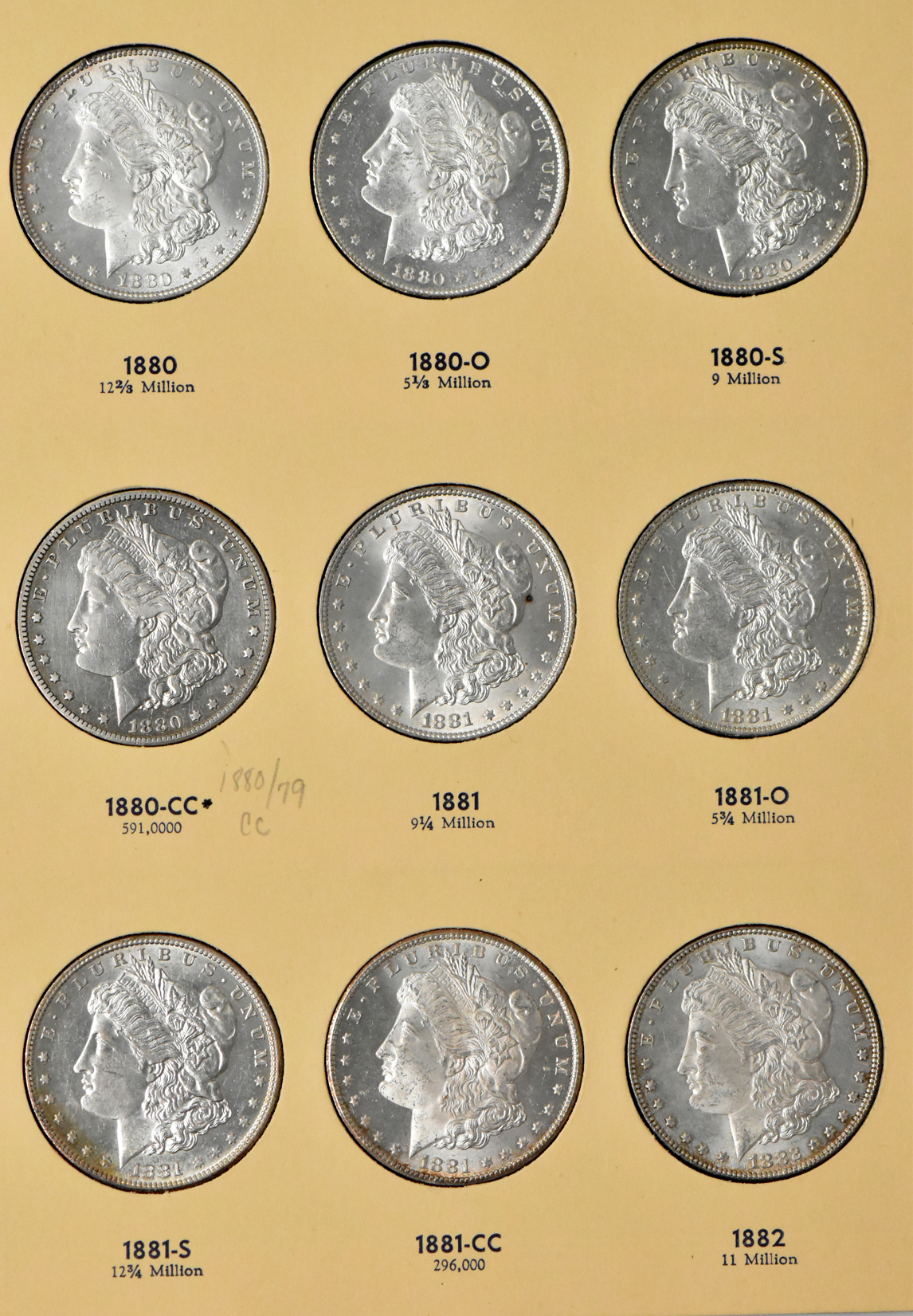 Group of 35 different Morgan dollars in Library of Coin Vol. 23 album
