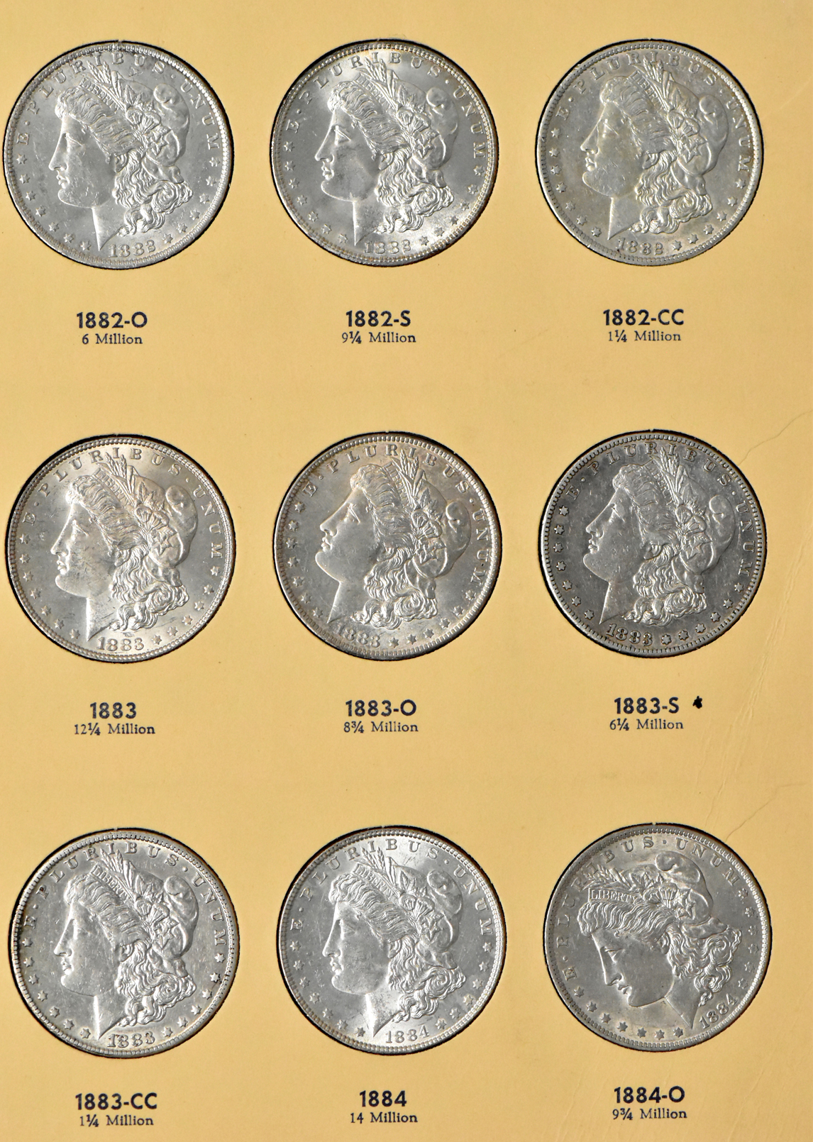 Group of 35 different Morgan dollars in Library of Coin Vol. 23 album
