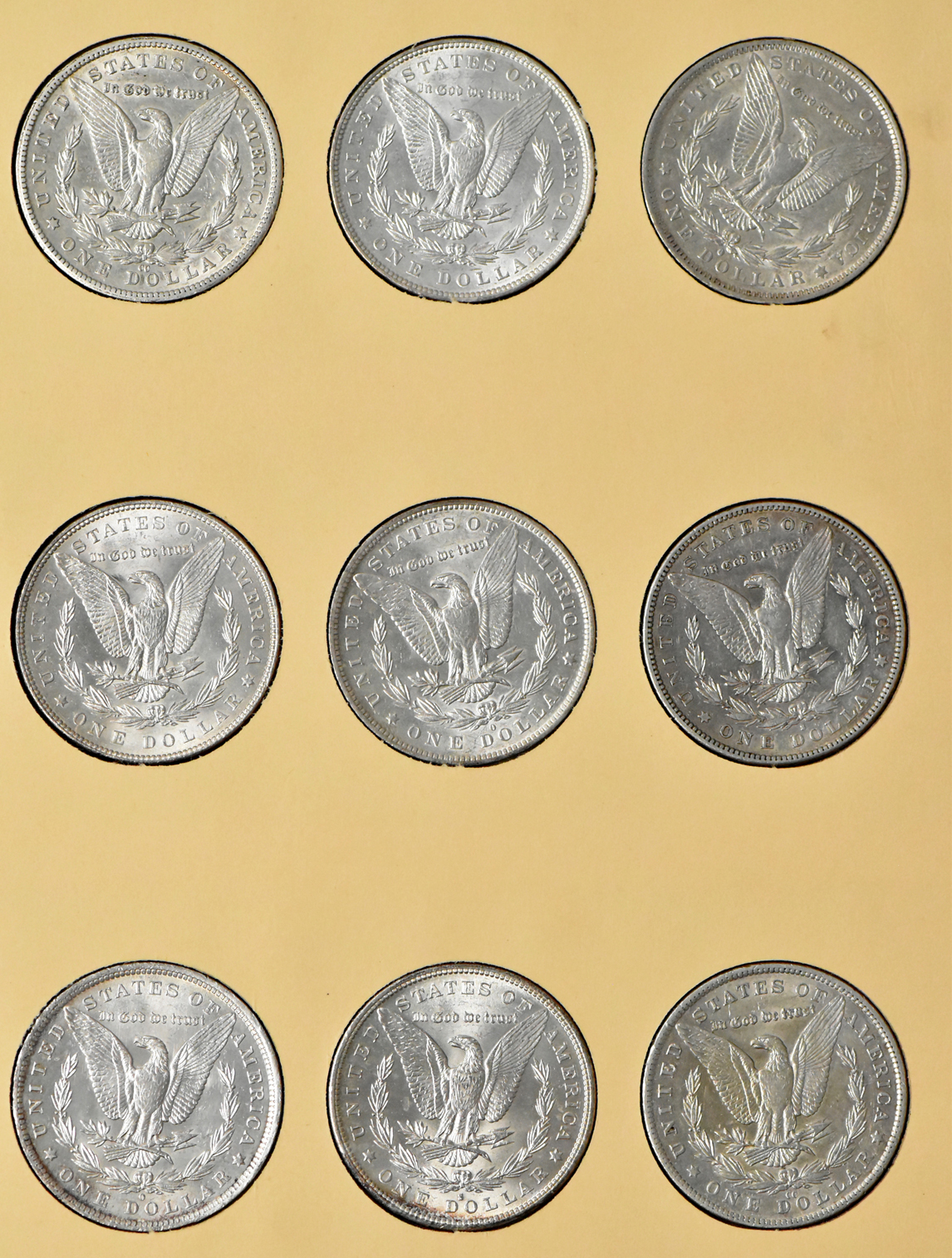 Group of 35 different Morgan dollars in Library of Coin Vol. 23 album