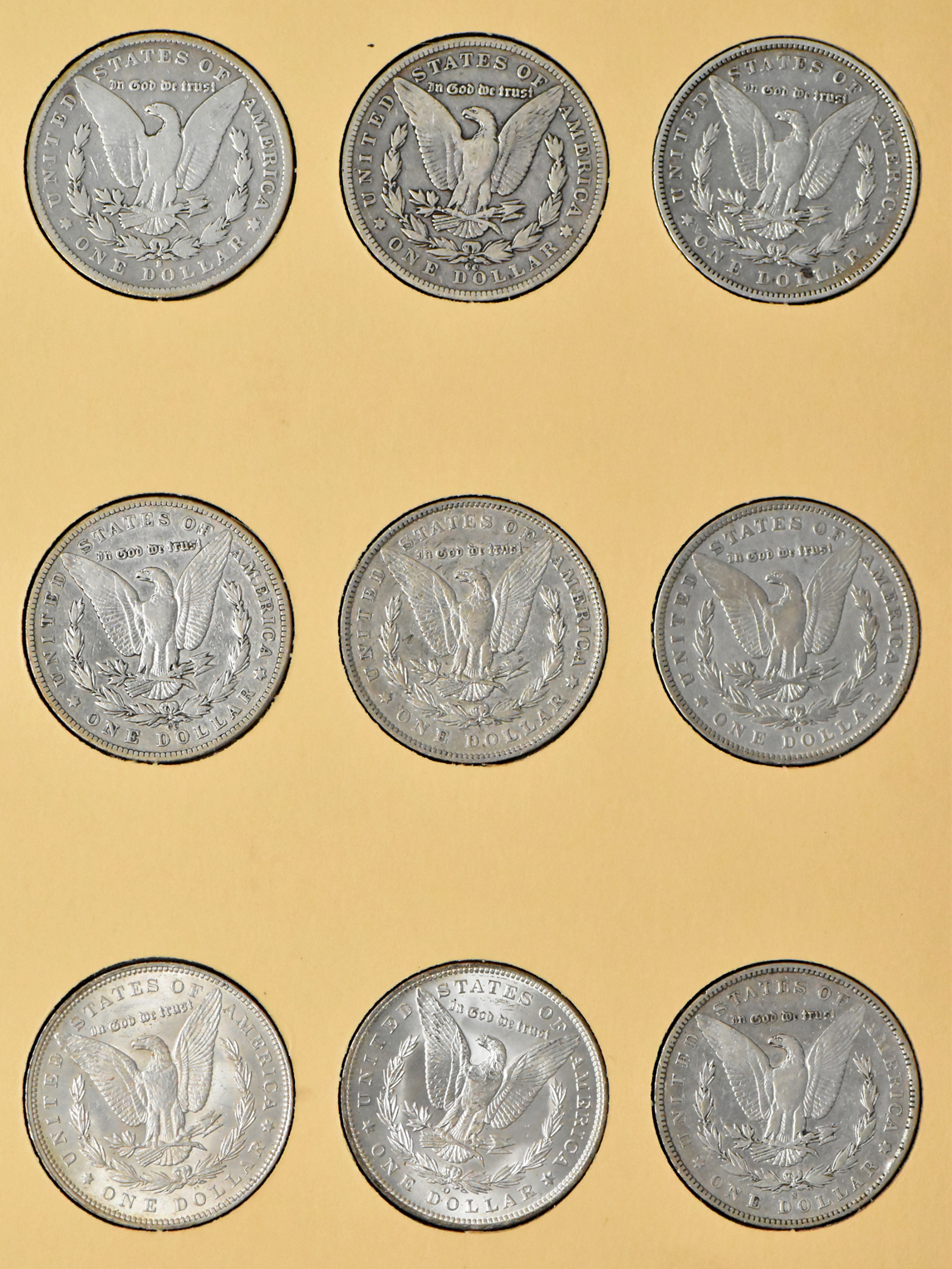Collection of 36 Morgan dollars, 1887 through 1897, in a Library of Coins Vol. 24 album