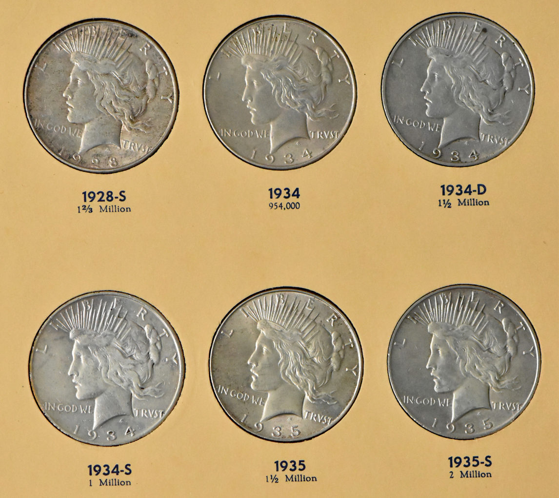 Collection of 24 Peace dollars in a complete Library of Coins Vol. 26 album