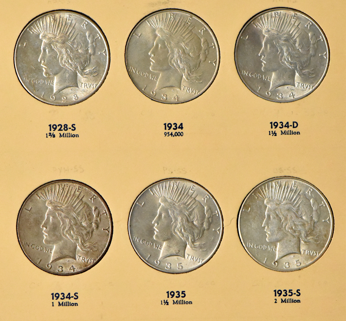 Collection of 24 Peace dollars in a complete Library of Coins Vol. 26 album