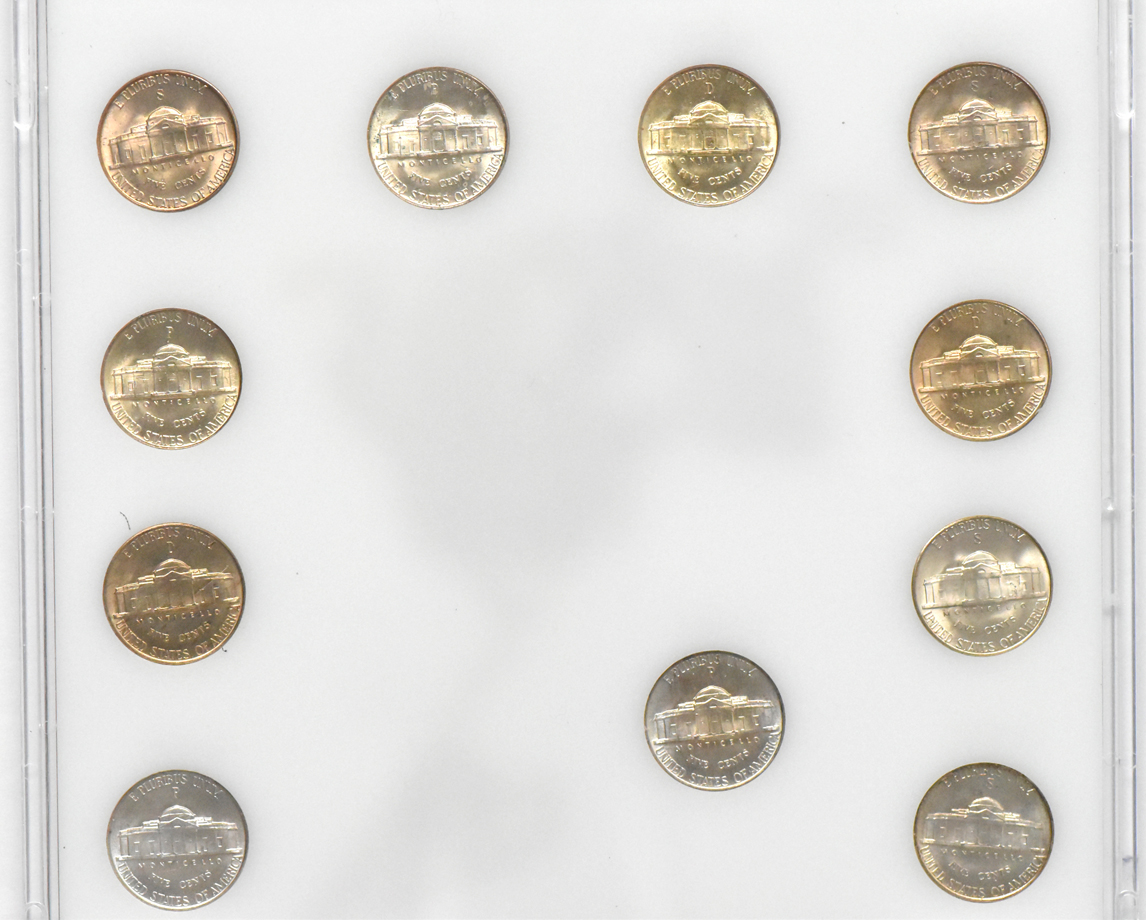 Two complete collections of War nickels in Capital Plastics holders