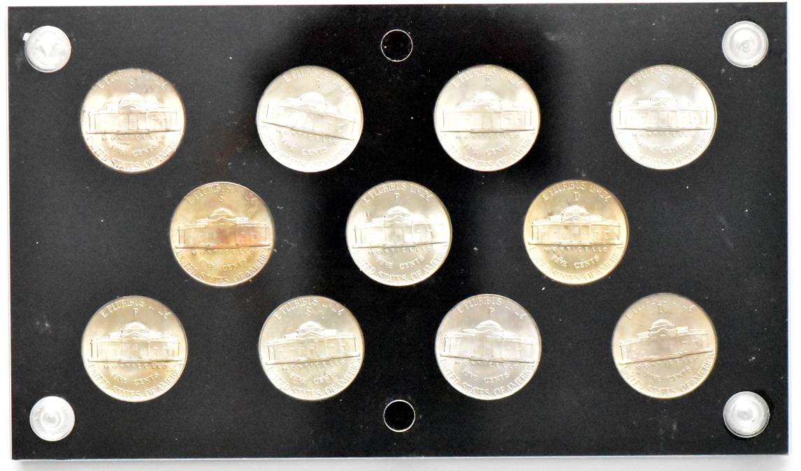 Two complete collections of War nickels in Capital Plastics holders