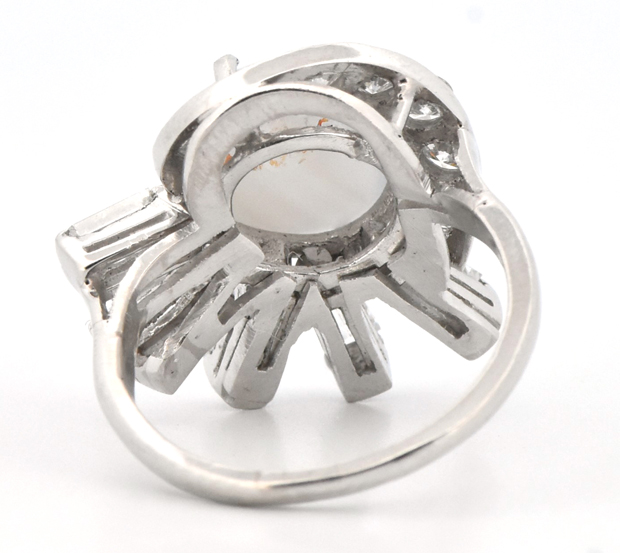 Platinum Diamond Ring with an Oval Cabochon Star Sapphire