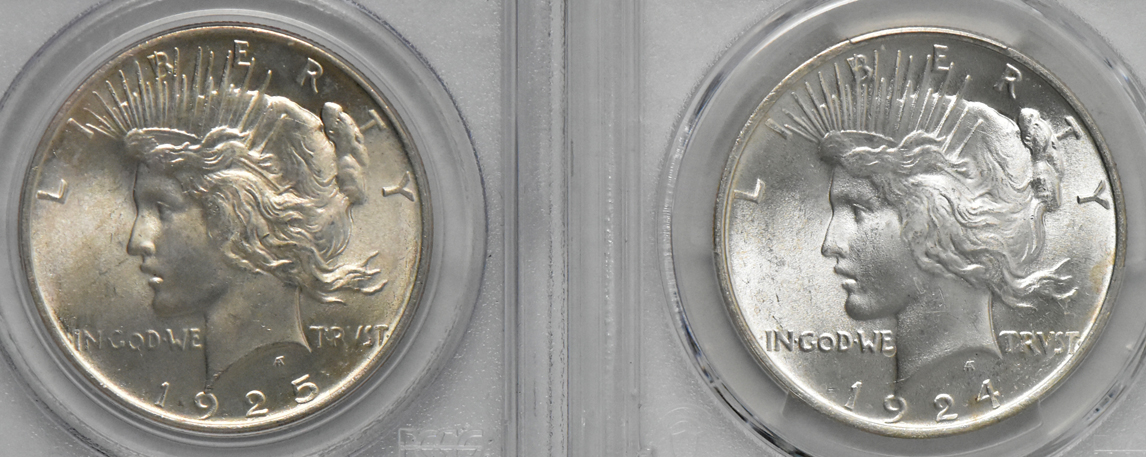 Four GEM Peace dollars certified by PCGS