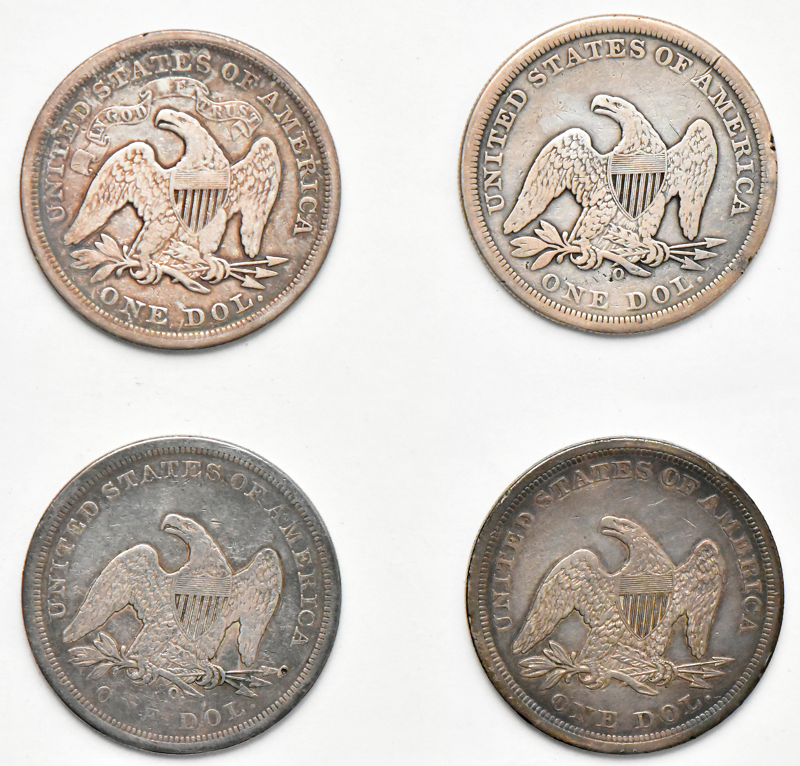 Four Liberty Seated dollars