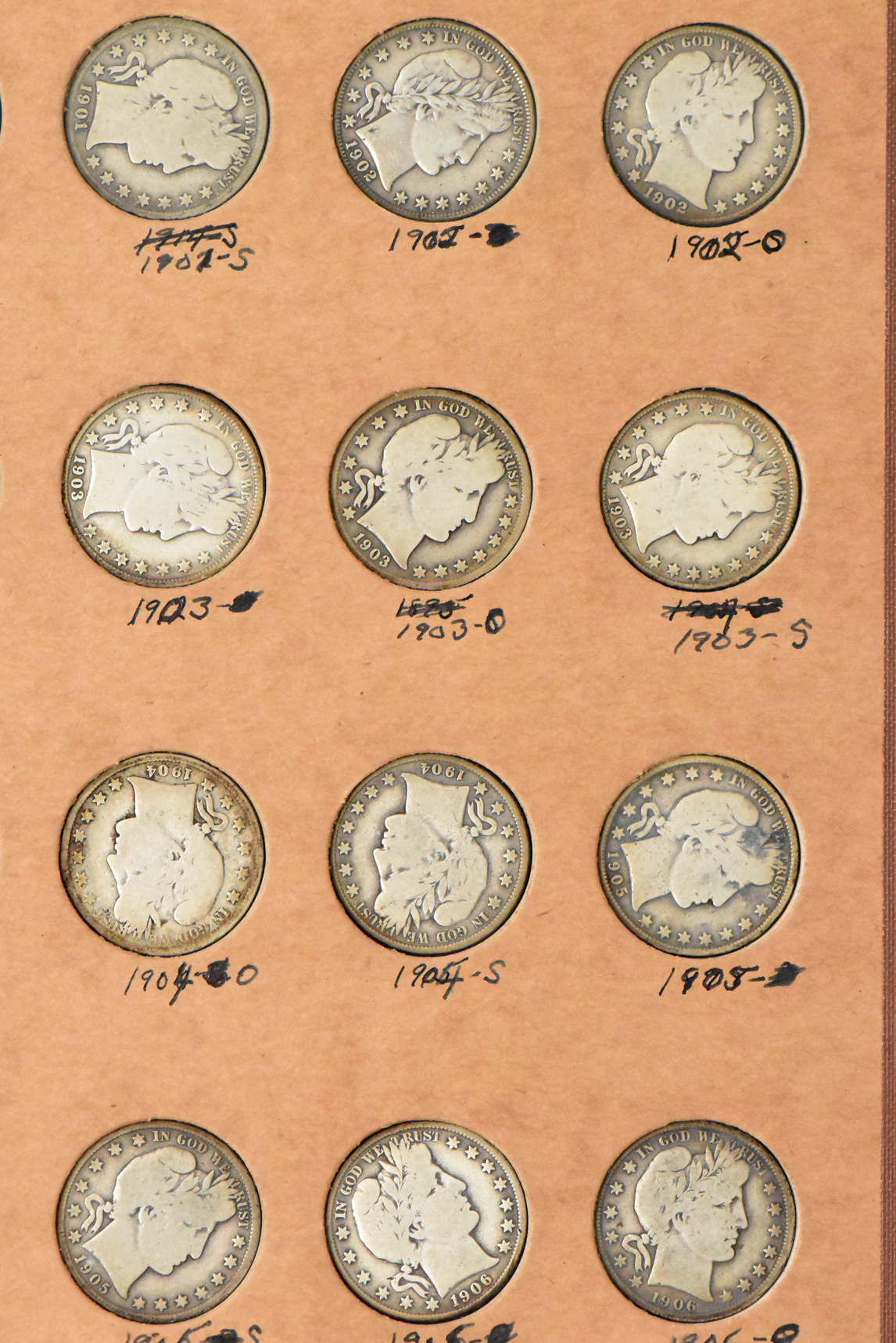 Collection of 47 different Barber half dollars in a The National Coin Album