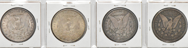 Group of twelve Morgan silver dollars