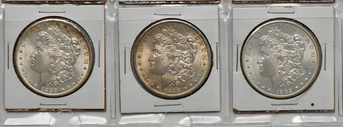 Group of 19 Morgan silver dollars