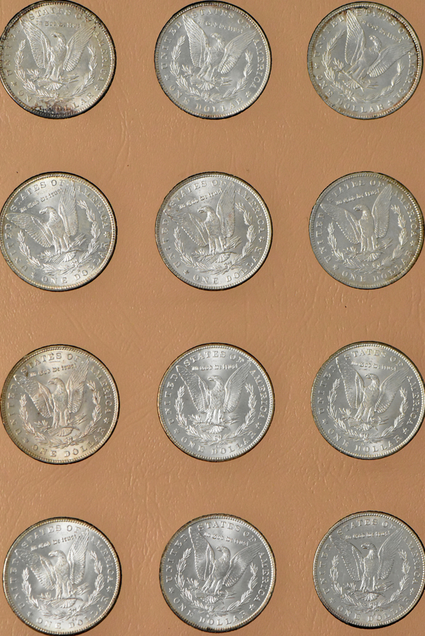 Collection of Morgan silver dollars, 1878 8TF through 1893-S, in a Dansco album