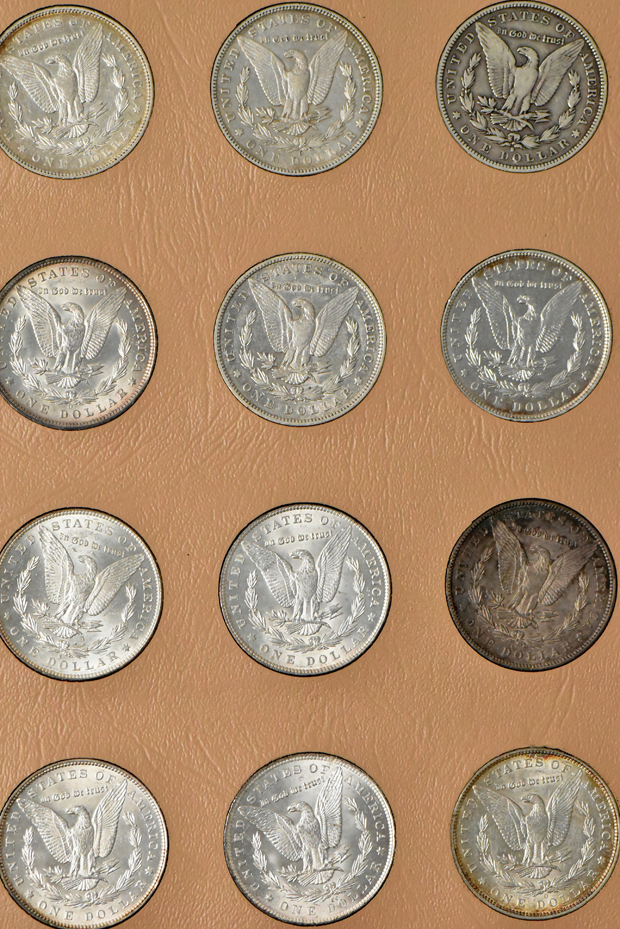 Collection of Morgan silver dollars, 1878 8TF through 1893-S, in a Dansco album