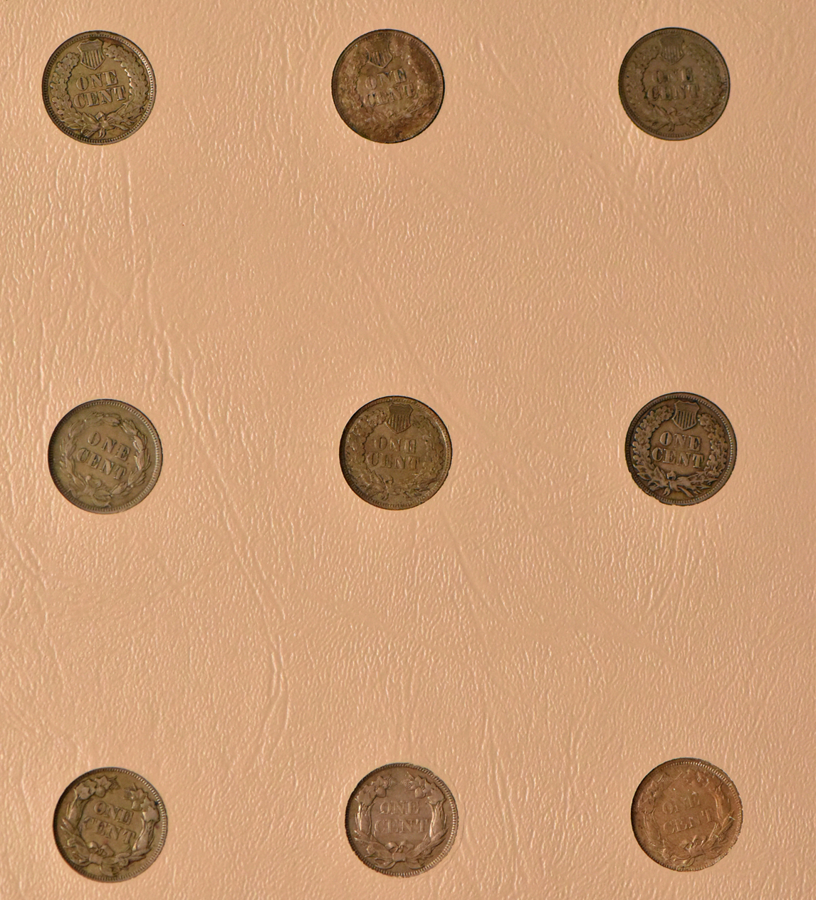 Collection of Flying Eagle and Indian Head cents, plus extras, in a complete Dansco 7101 album