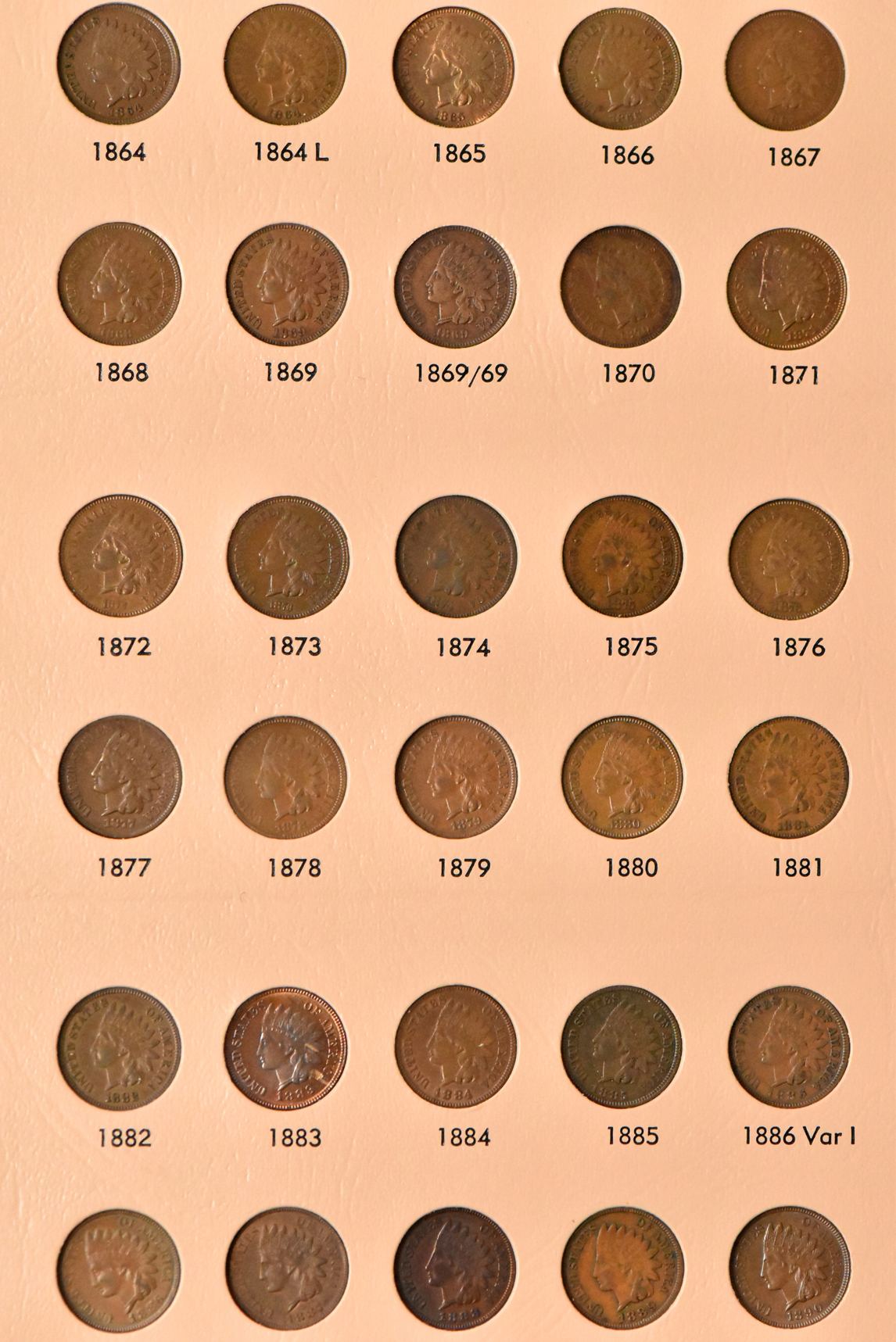 Collection of Flying Eagle and Indian Head cents, plus extras, in a complete Dansco 7101 album