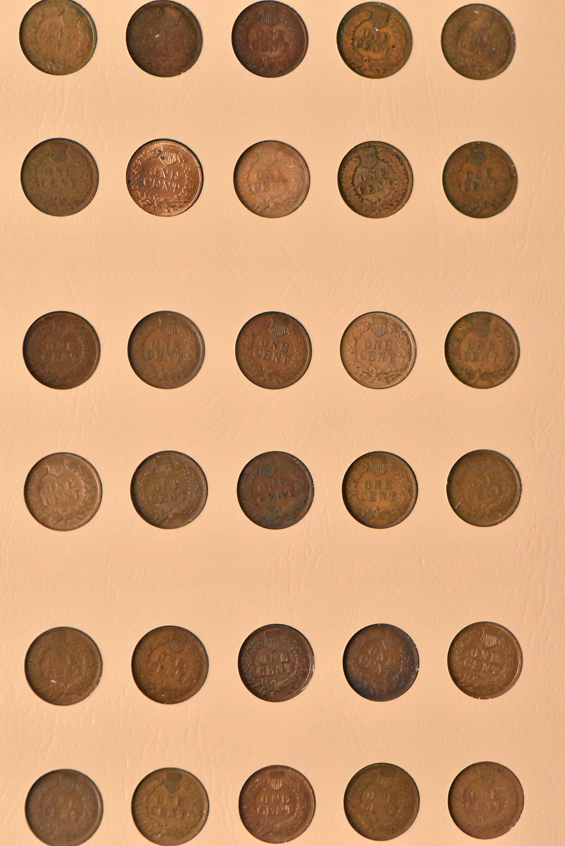 Collection of Flying Eagle and Indian Head cents, plus extras, in a complete Dansco 7101 album