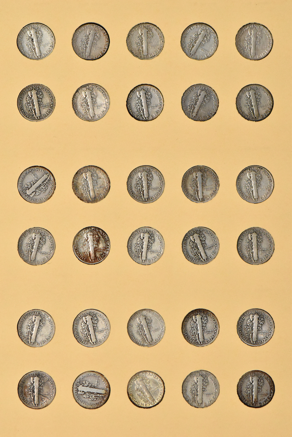 Complete collections of Mercury and Roosevelt dimes in seperate Library of Coins albums