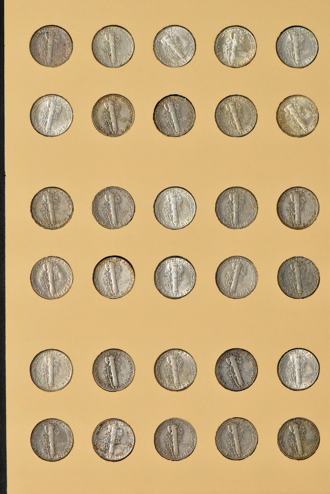 Complete collections of Mercury and Roosevelt dimes in seperate Library of Coins albums