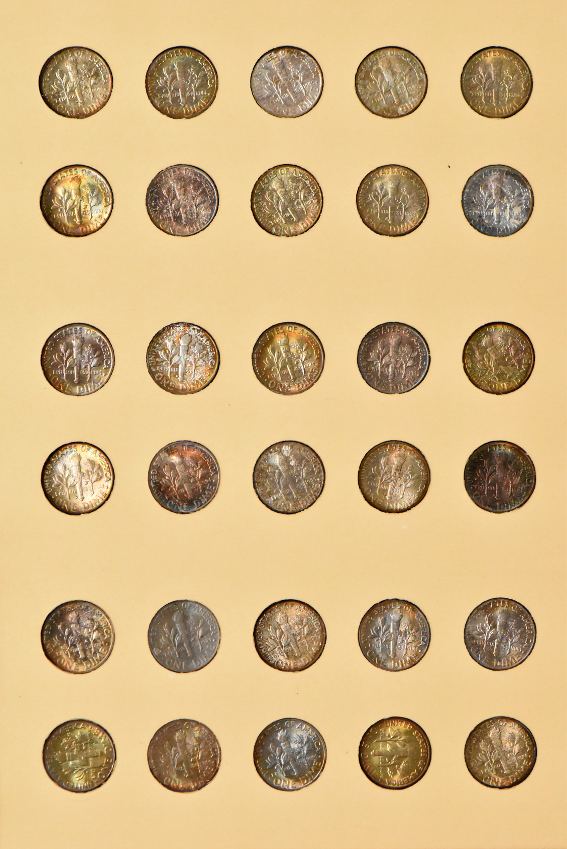Complete collections of Mercury and Roosevelt dimes in seperate Library of Coins albums
