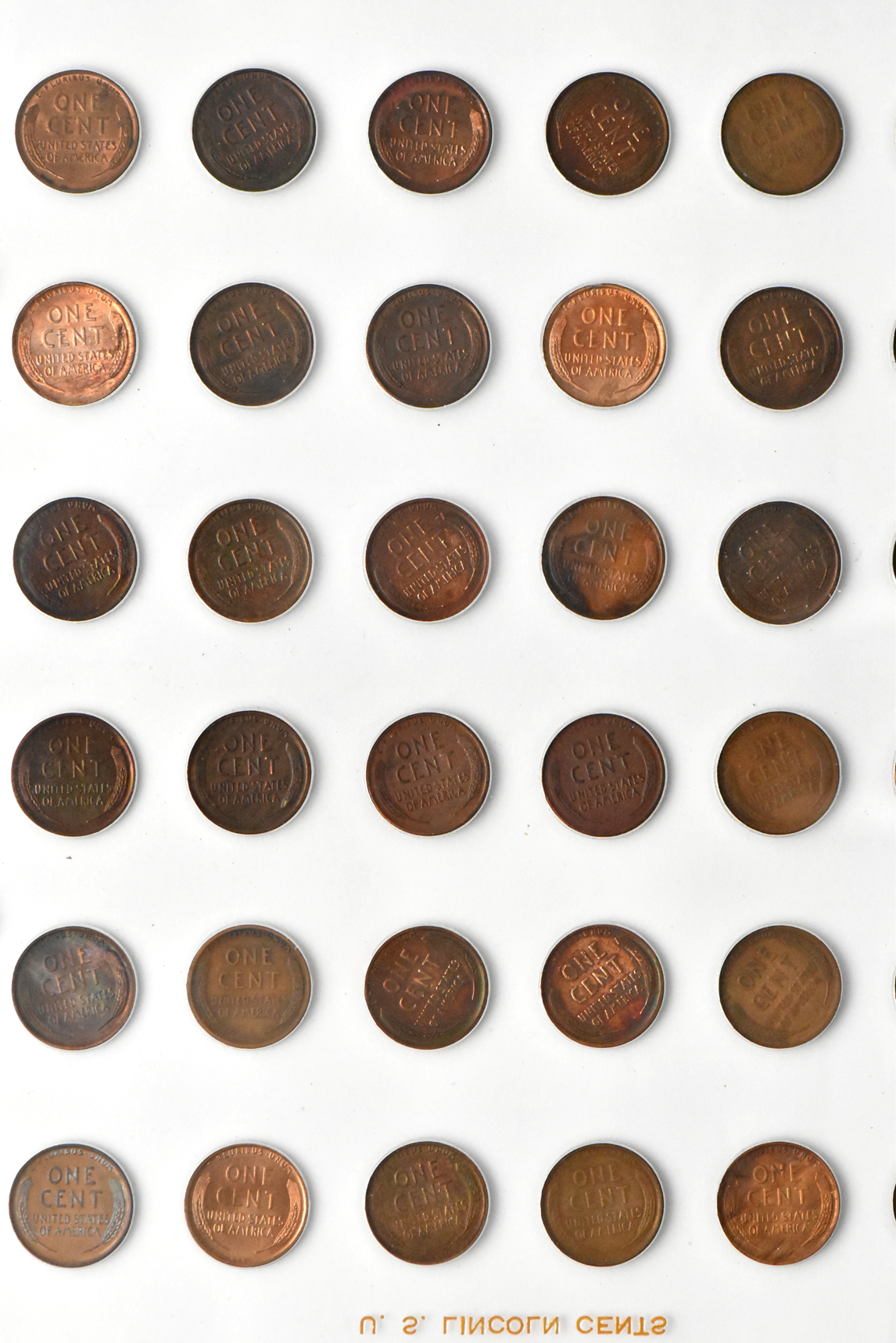 Collection of Lincoln cents, 1909 through 1950-S, in a The National Coin Album