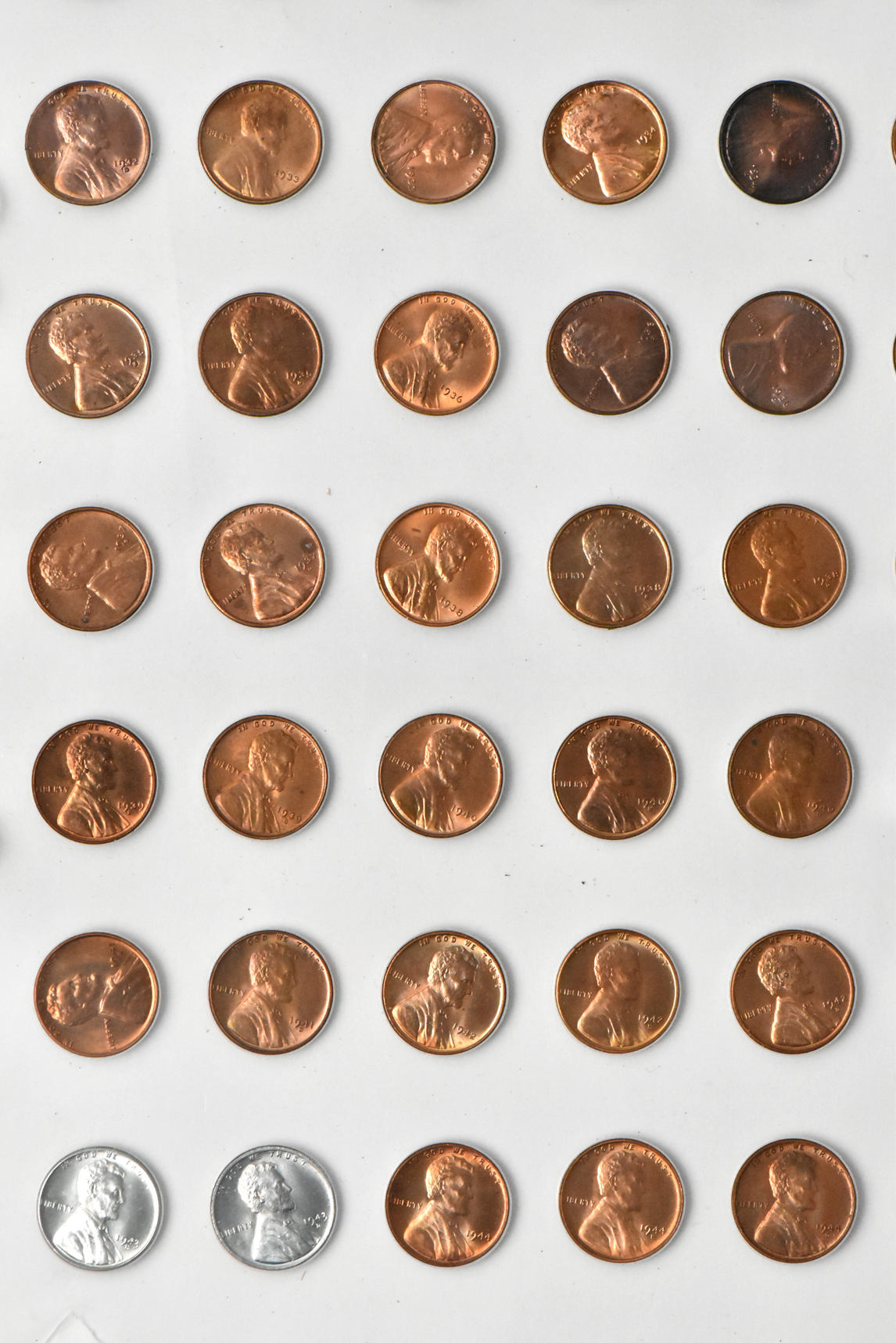 Collection of Lincoln cents, 1909 through 1950-S, in a The National Coin Album