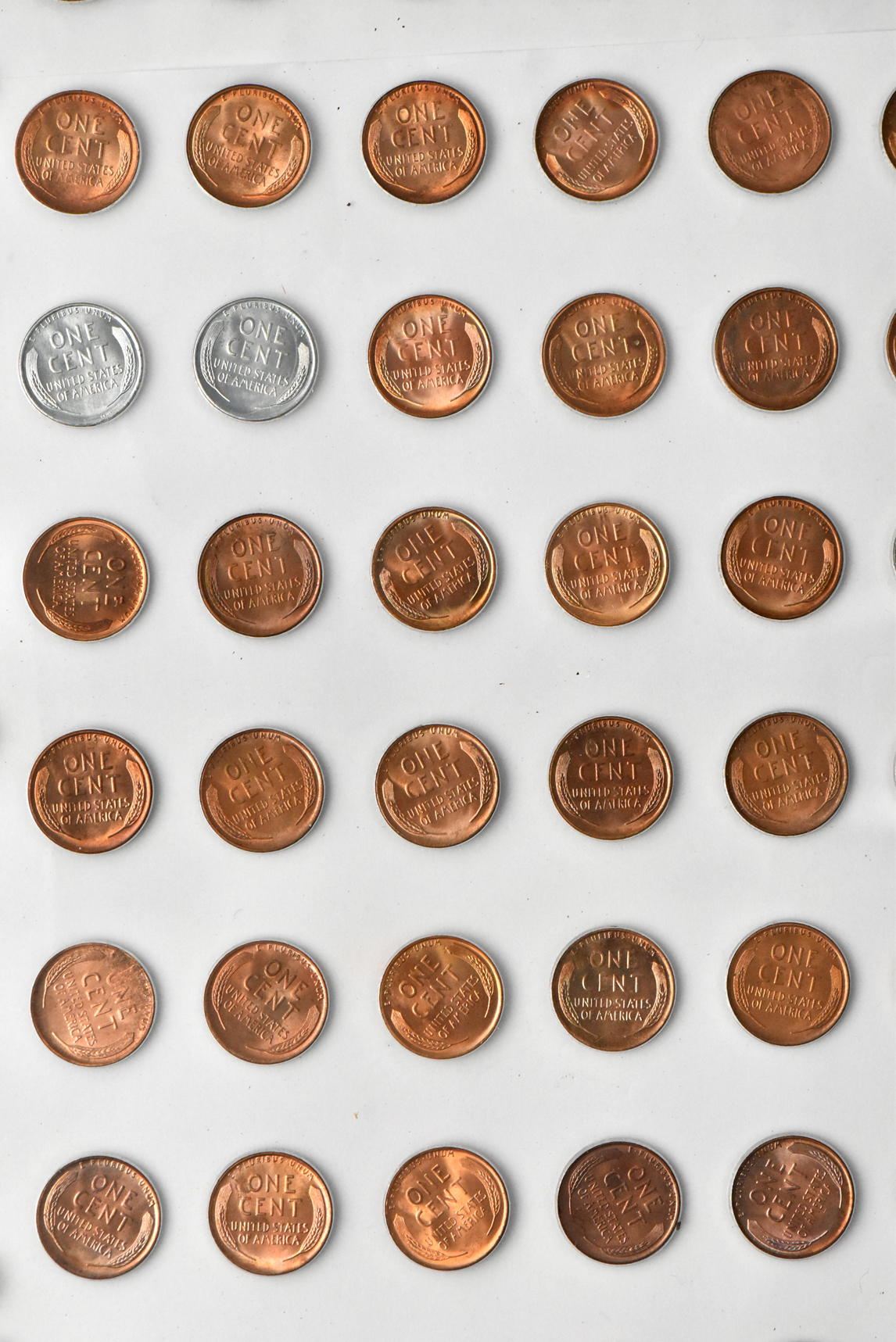 Collection of Lincoln cents, 1909 through 1950-S, in a The National Coin Album