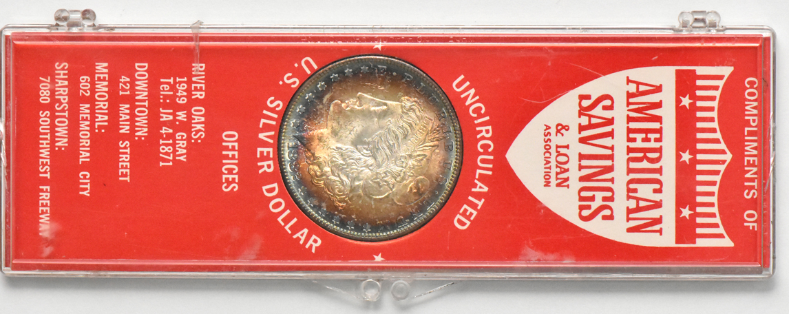 Four Morgan silver dollars.  One Redford, one Paramount, and two in American Savings & Loan cases