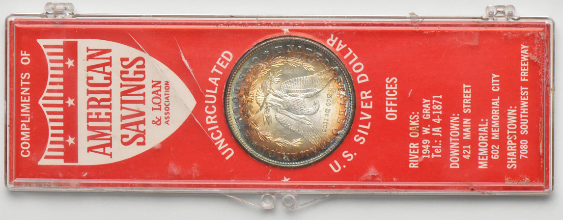 Four Morgan silver dollars.  One Redford, one Paramount, and two in American Savings & Loan cases