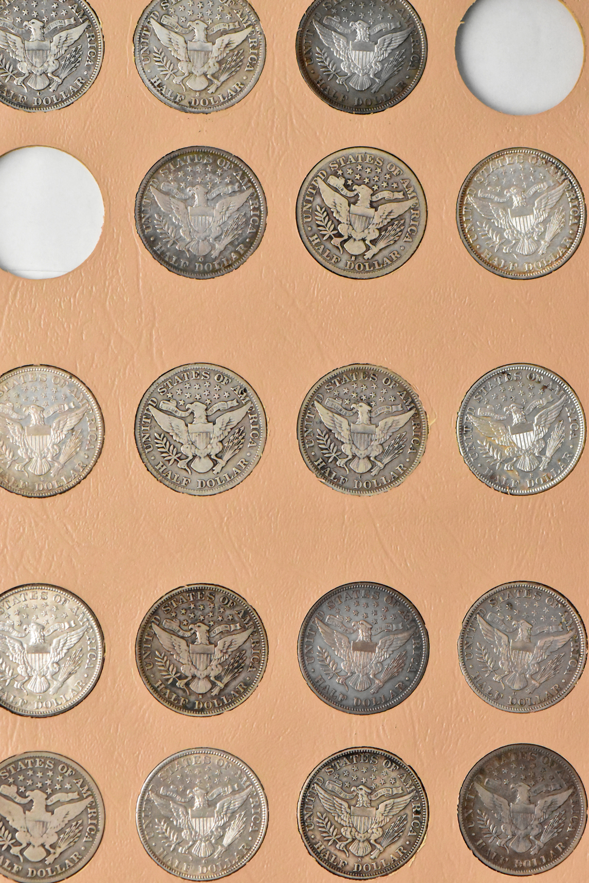 Collection of 69 different Barber half dollars in a Dansco 7150 album