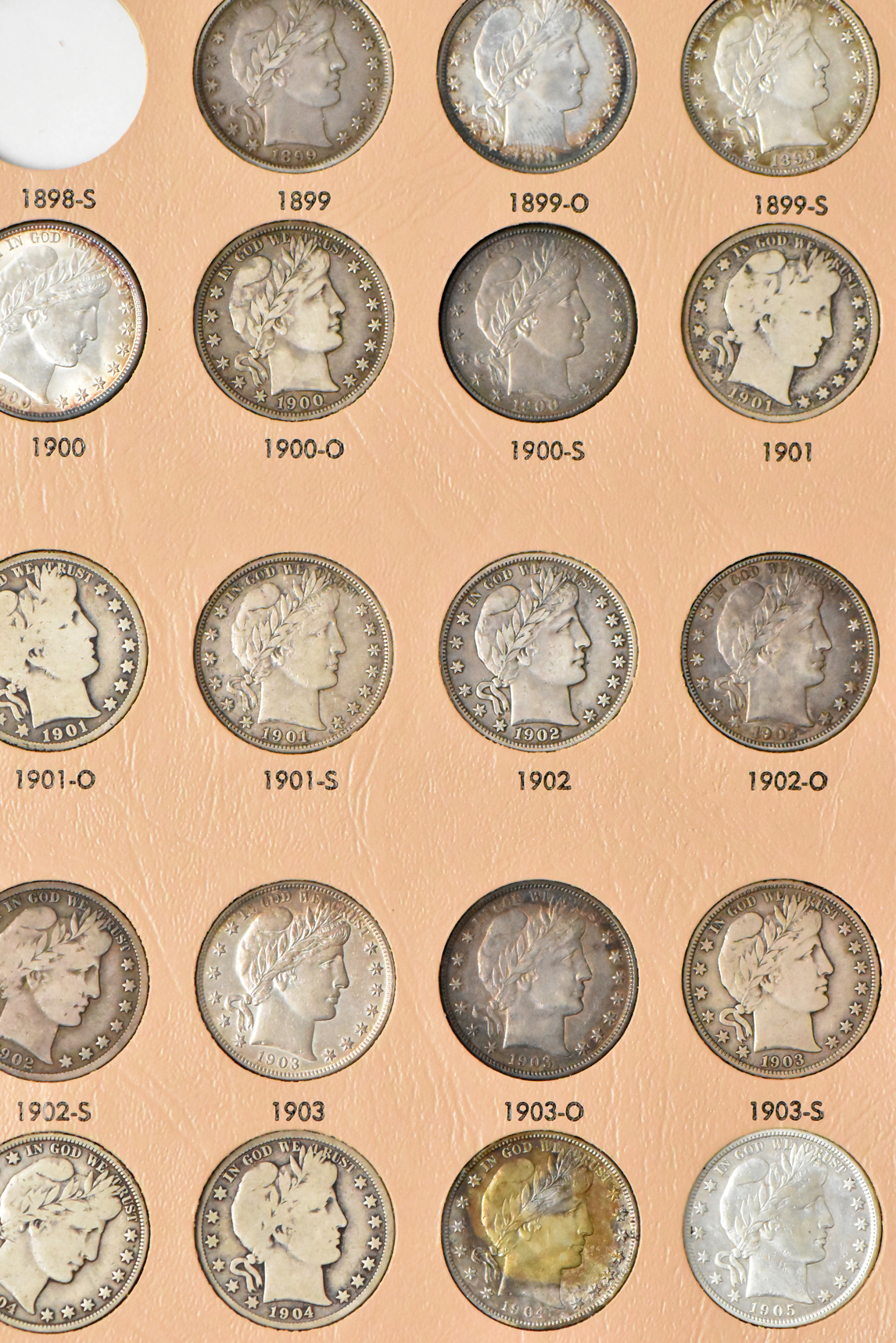 Collection of 69 different Barber half dollars in a Dansco 7150 album