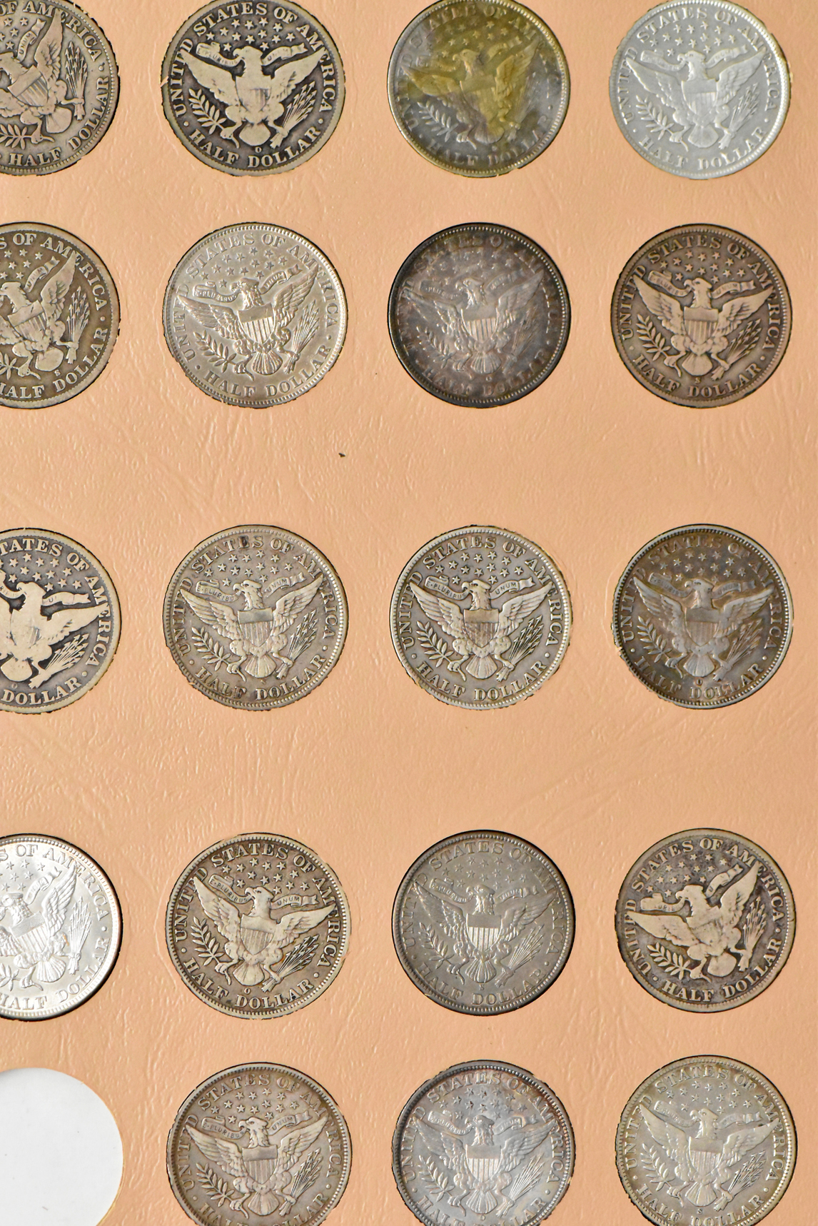 Collection of 69 different Barber half dollars in a Dansco 7150 album