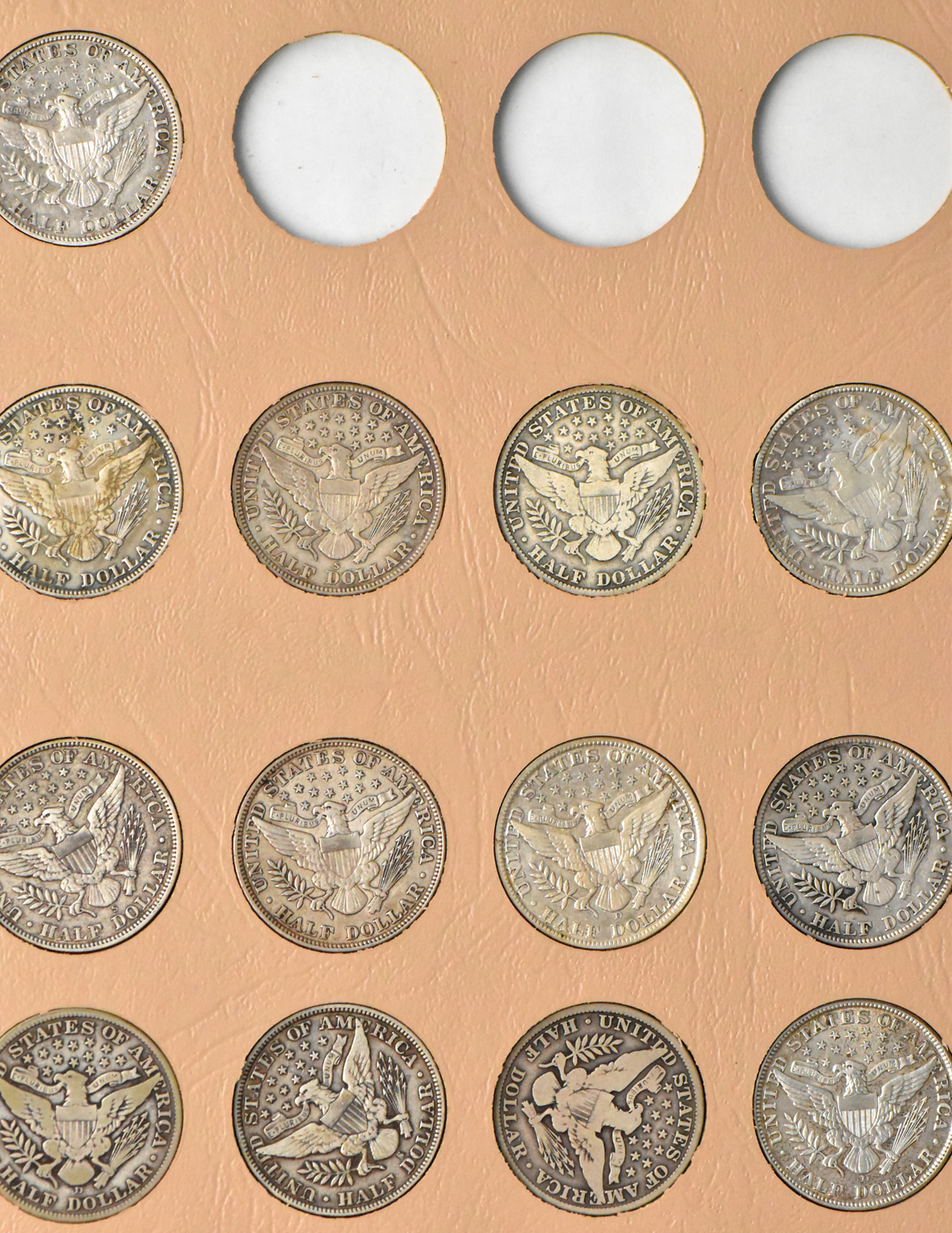 Collection of 69 different Barber half dollars in a Dansco 7150 album