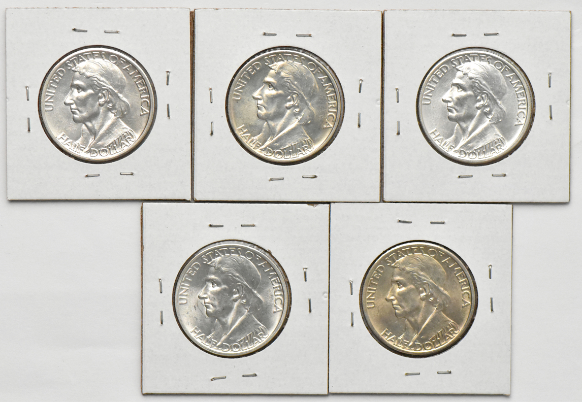 Five Daniel Boone silver commemorative half dollars