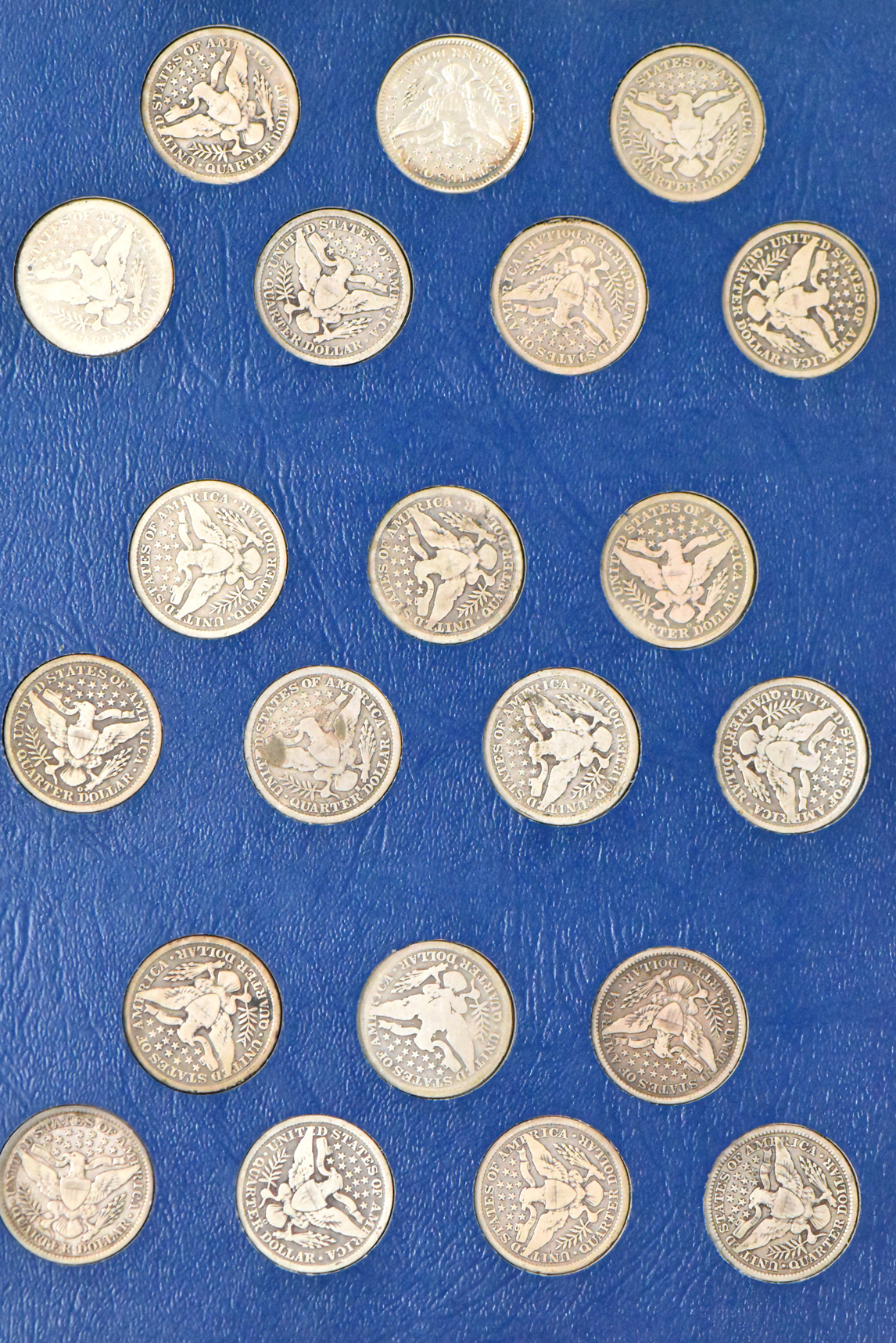 Collection of Barber quarters in a complete Whitman 9416 album