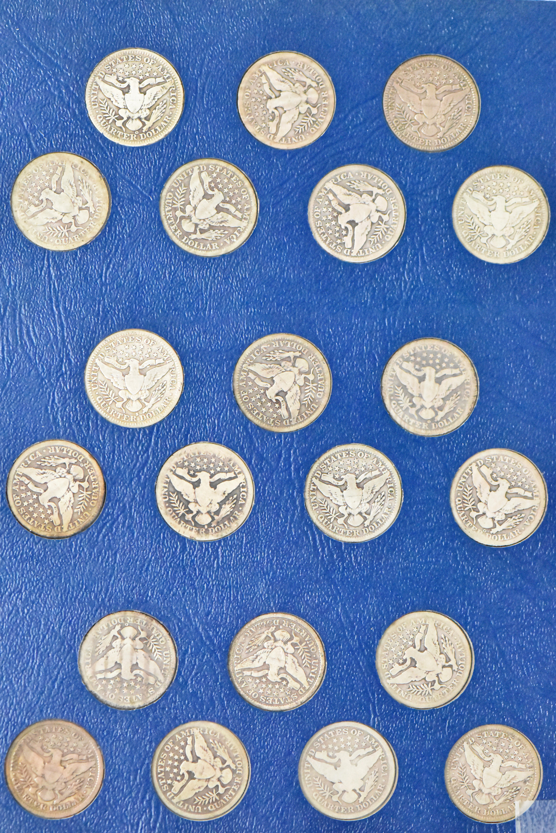 Collection of Barber quarters in a complete Whitman 9416 album