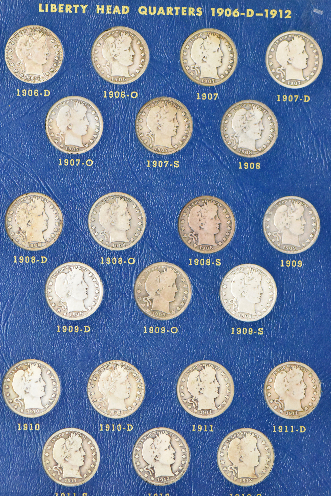 Collection of Barber quarters in a complete Whitman 9416 album