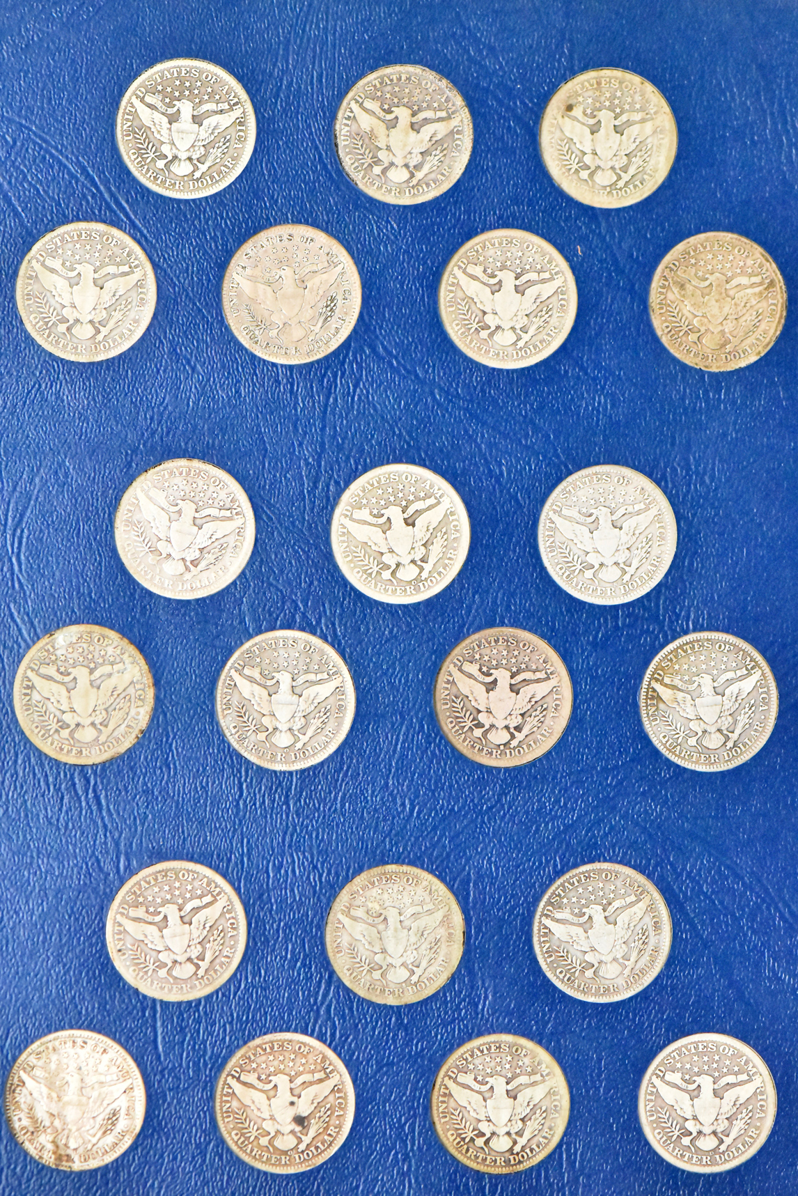 Collection of Barber quarters in a complete Whitman 9416 album