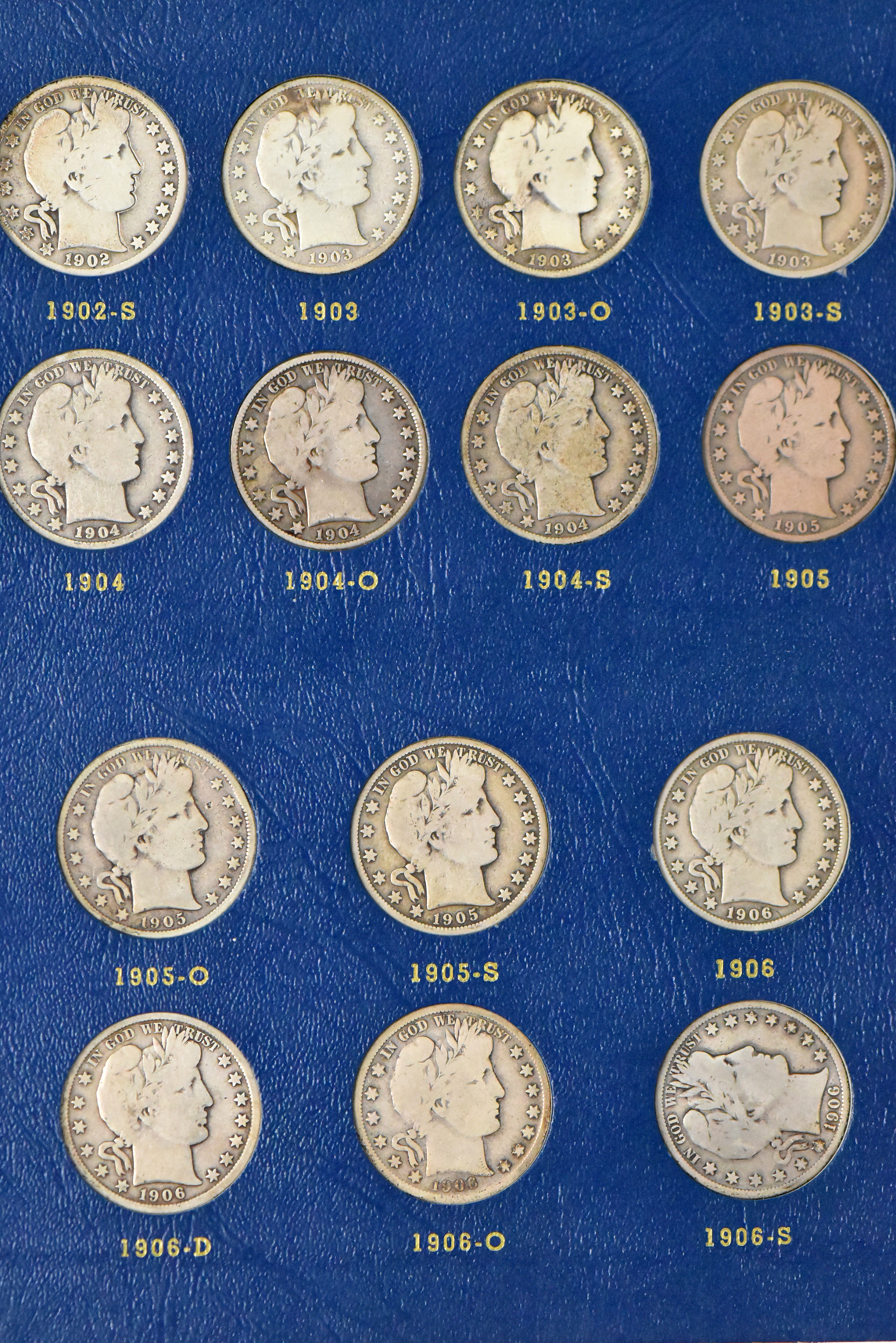 Collection of Barber half dollars in complete Whitman 9420 and 9421 albums