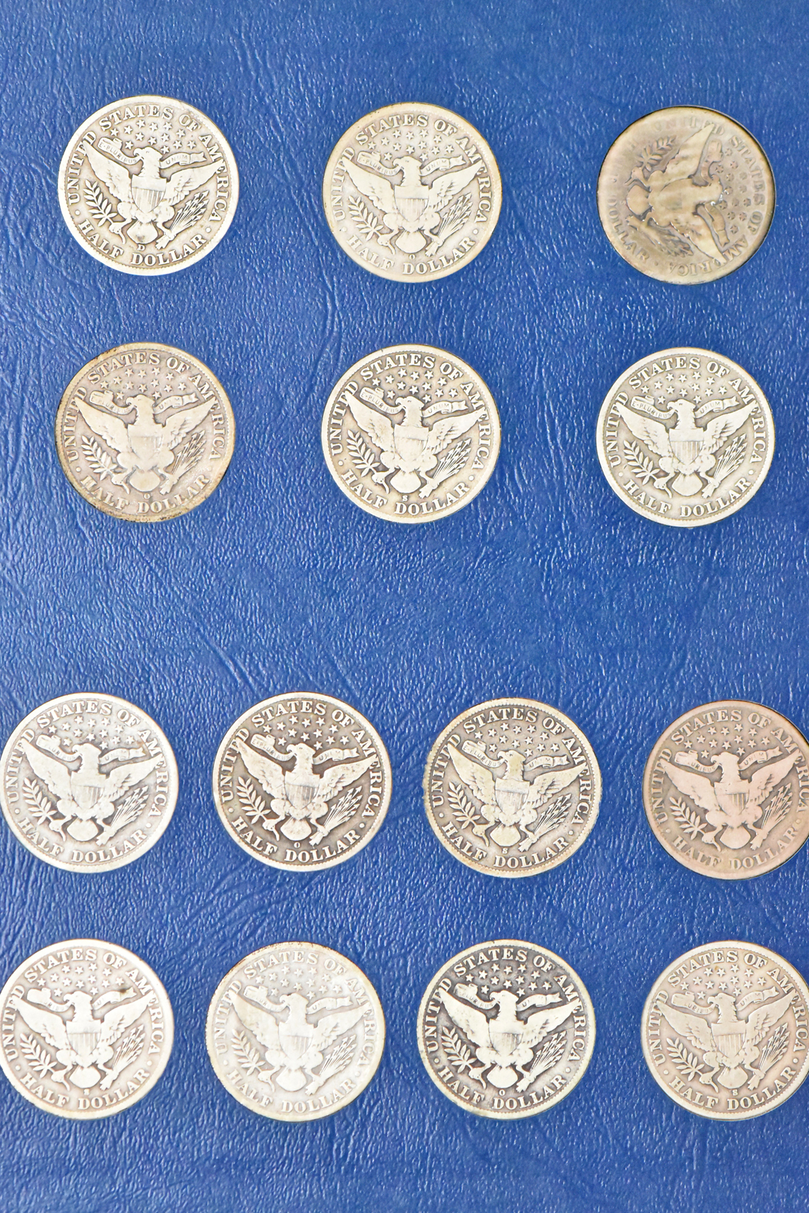 Collection of Barber half dollars in complete Whitman 9420 and 9421 albums