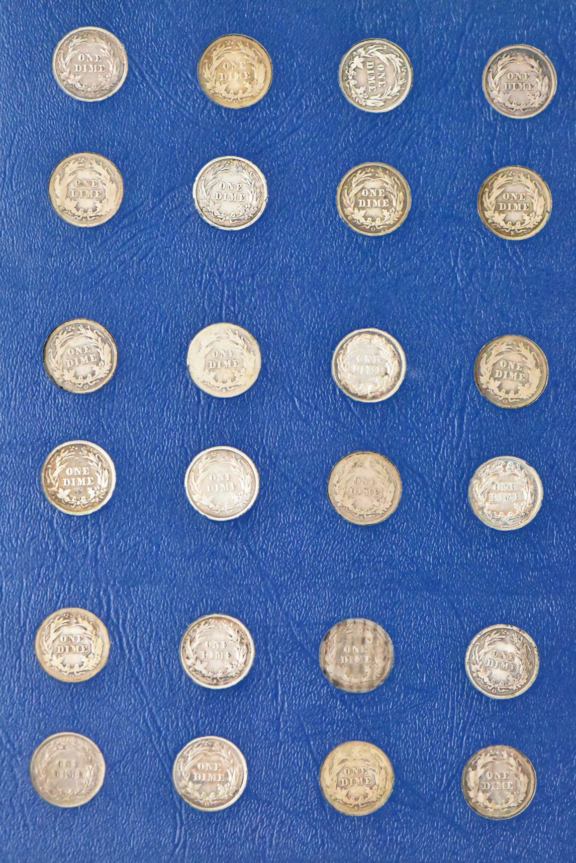 Collection of Barber Dimes in a complete Whitman 9412 album