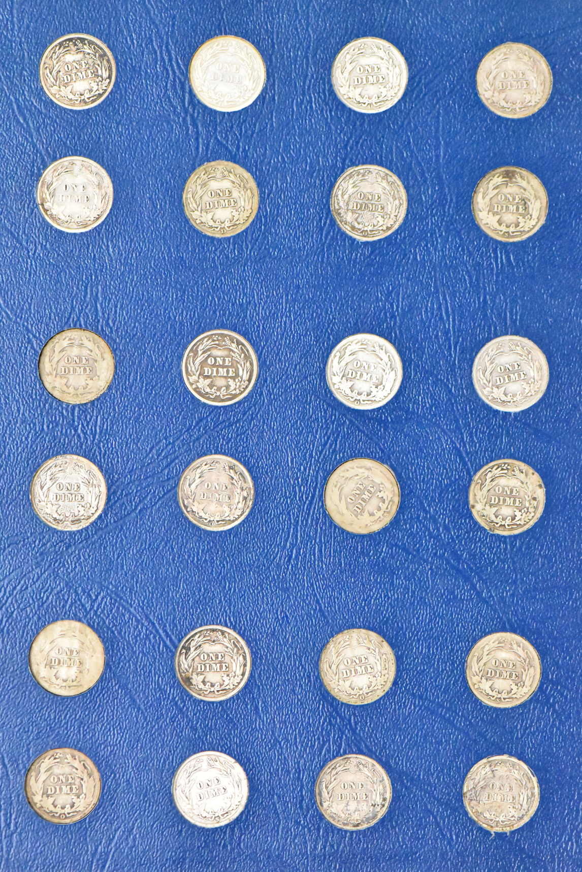 Collection of Barber Dimes in a complete Whitman 9412 album