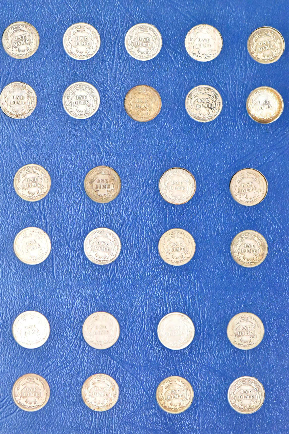 Collection of Barber Dimes in a complete Whitman 9412 album