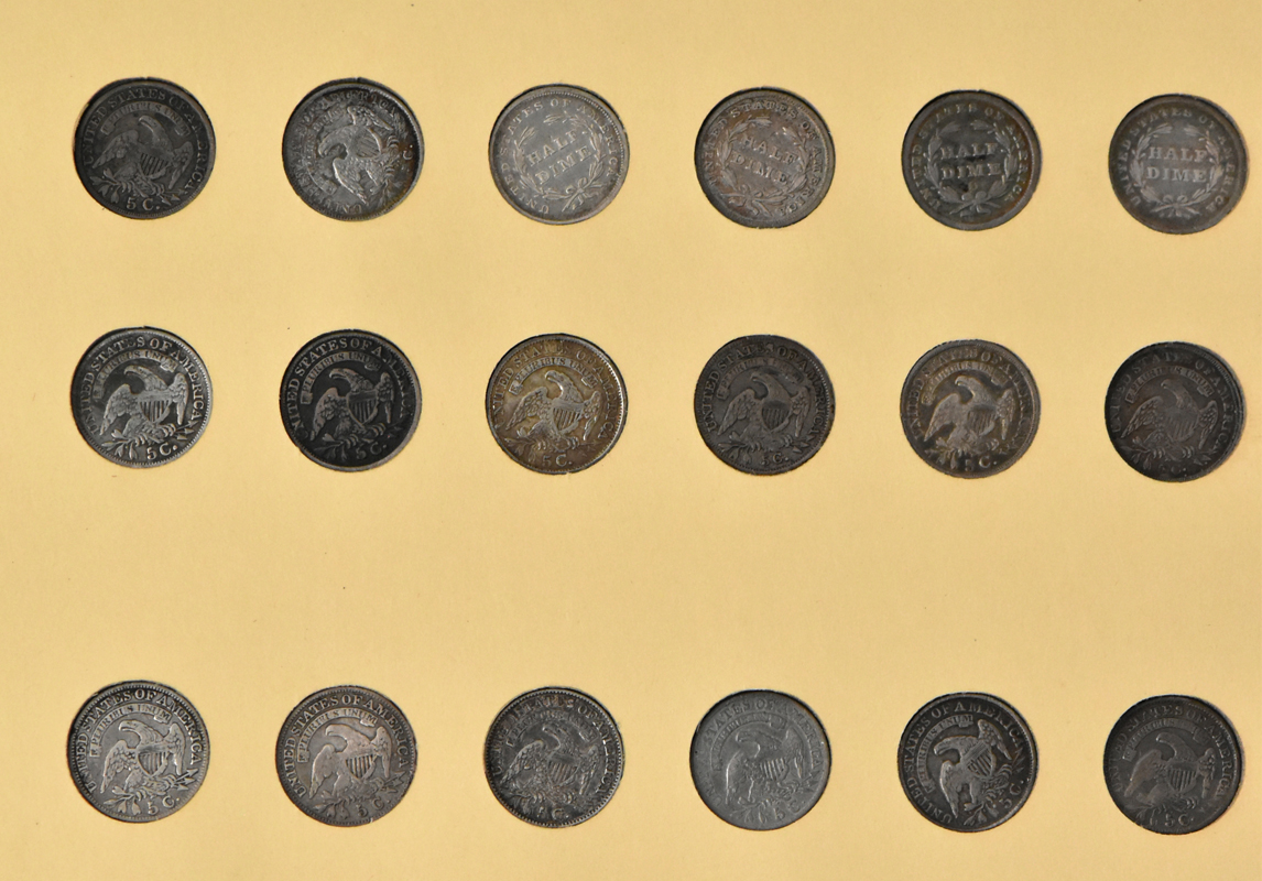 Collection of 86 different half dimes in a Library of Coins Vol. 40 album