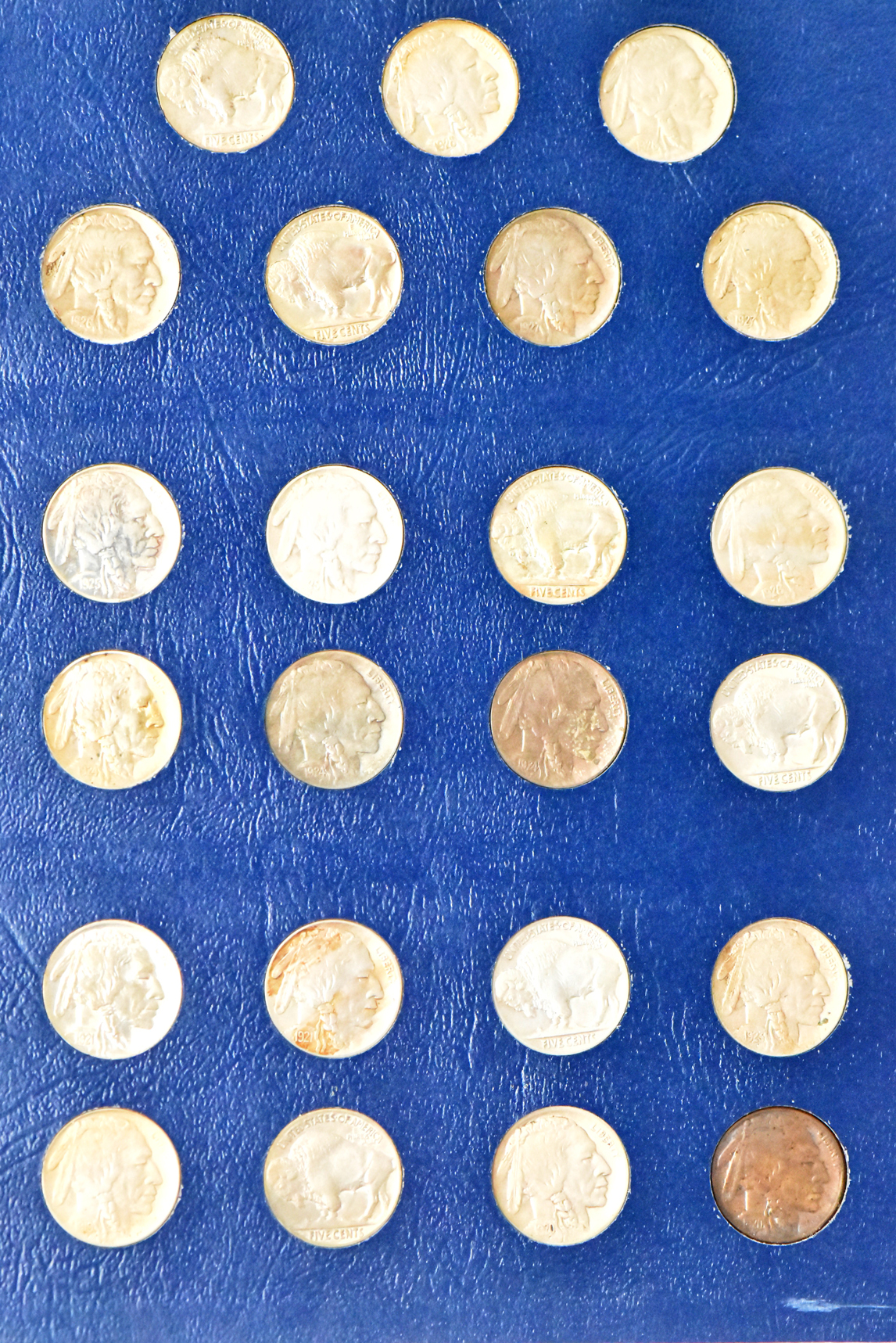 Collection of 65 different Buffalo nickels in a nearly complete Whitman 9403