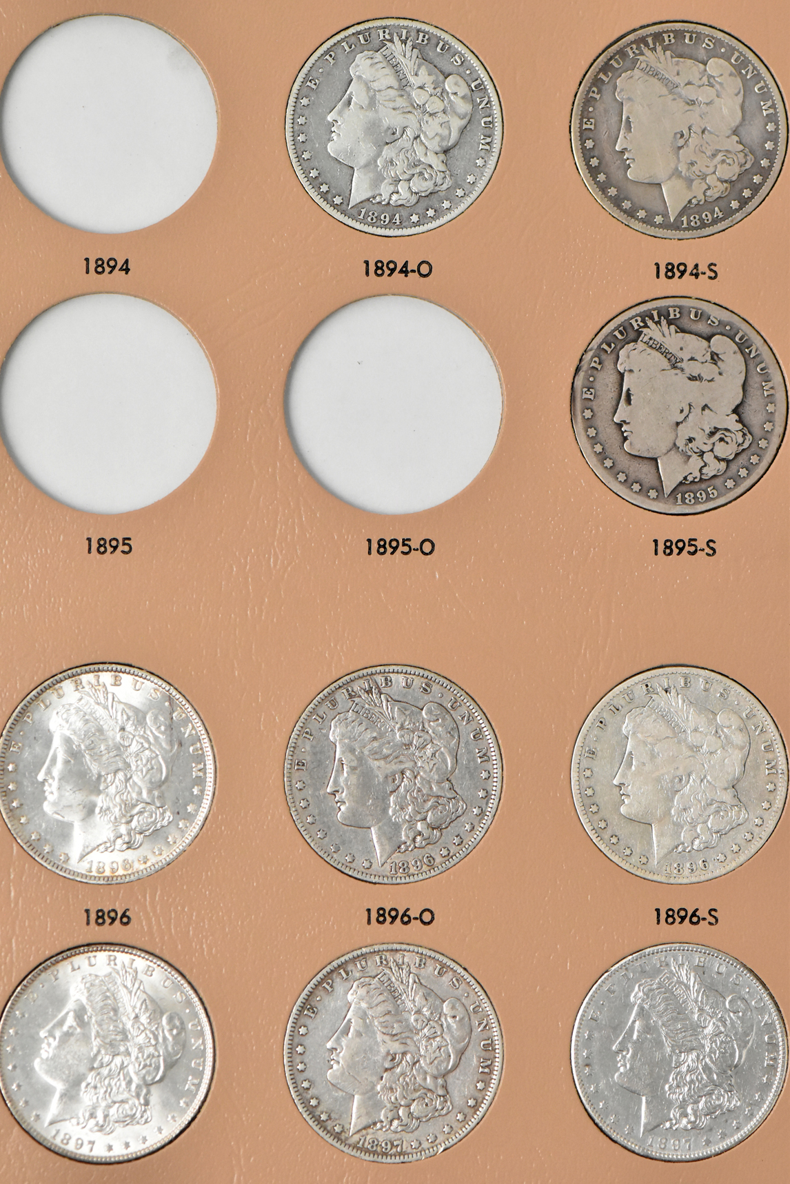 Collection of 42 Morgan dollars in a Dansco 7179 album