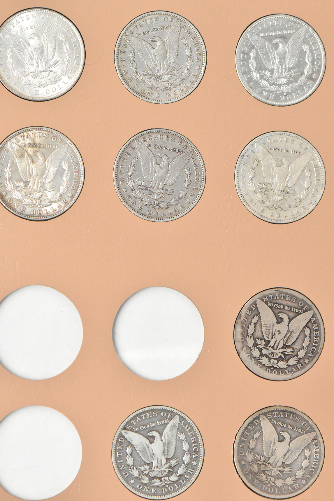 Collection of 42 Morgan dollars in a Dansco 7179 album
